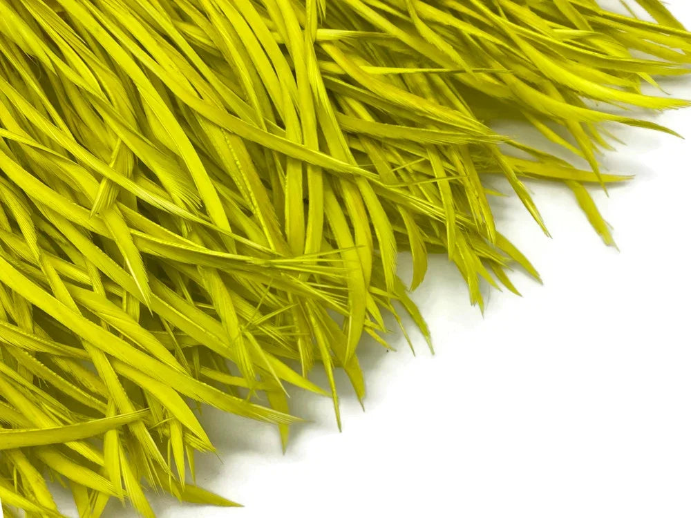 Vibrant yellow dyed feathers for DIY crafts and fashion accessories.
