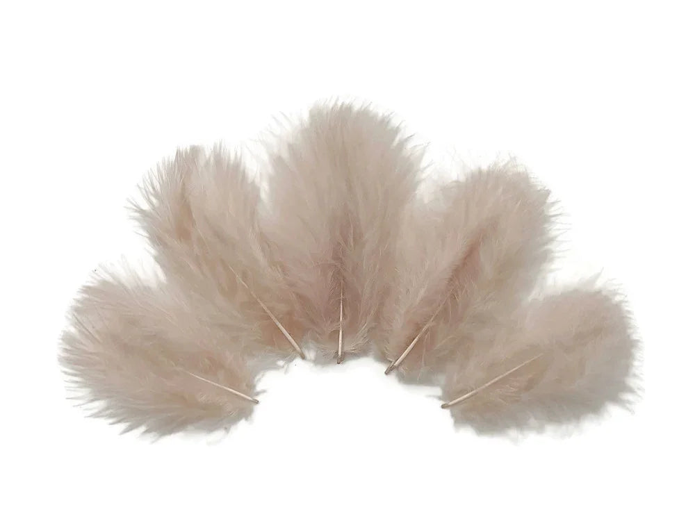 Soft beige fluffy feathers for DIY crafts and fashion decor.
