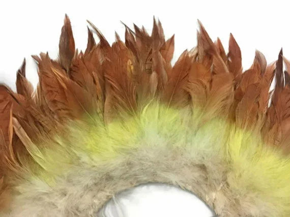Brown and yellow natural feathers for DIY crafts and fashion accessories.