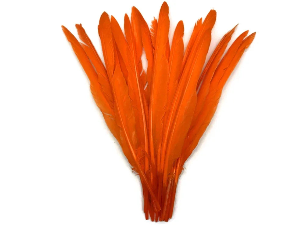 Vibrant orange craft feathers for DIY fashion and decor projects.
