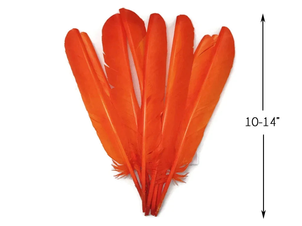 Vibrant orange craft feathers, 10-14 inches long, for DIY fashion and decor.