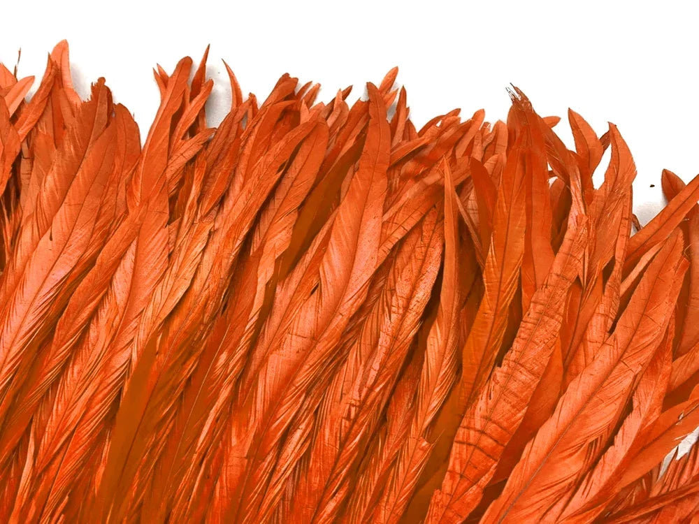 2.5 Inch Strip - 8-10" Orange Strung Natural Bleach & Dyed Coque Tails Feathers