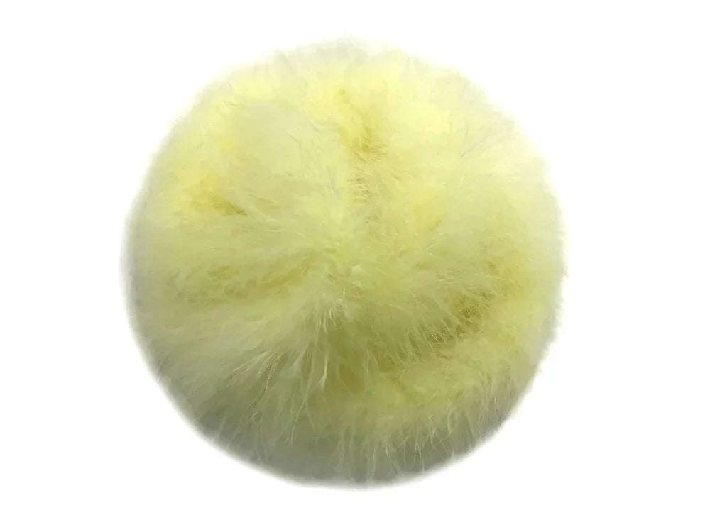 Fluffy pale yellow feather pompom for DIY crafts and fashion accessories