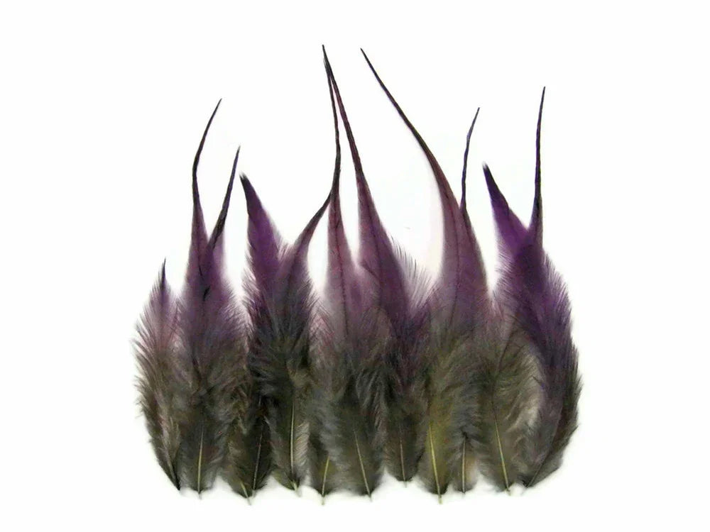 Set of vibrant purple and dark grey natural feathers for DIY crafts and fashion décor.