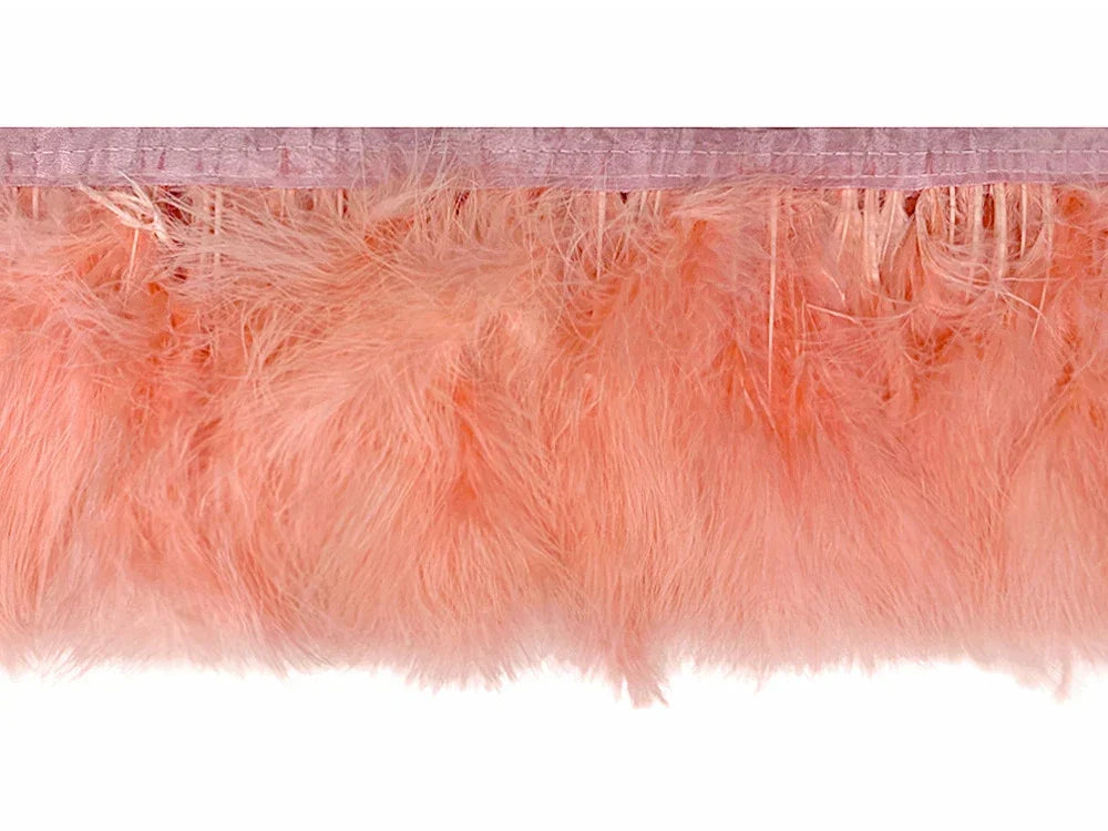 Peach colored ostrich feather boa trim for fashion and DIY crafts.
