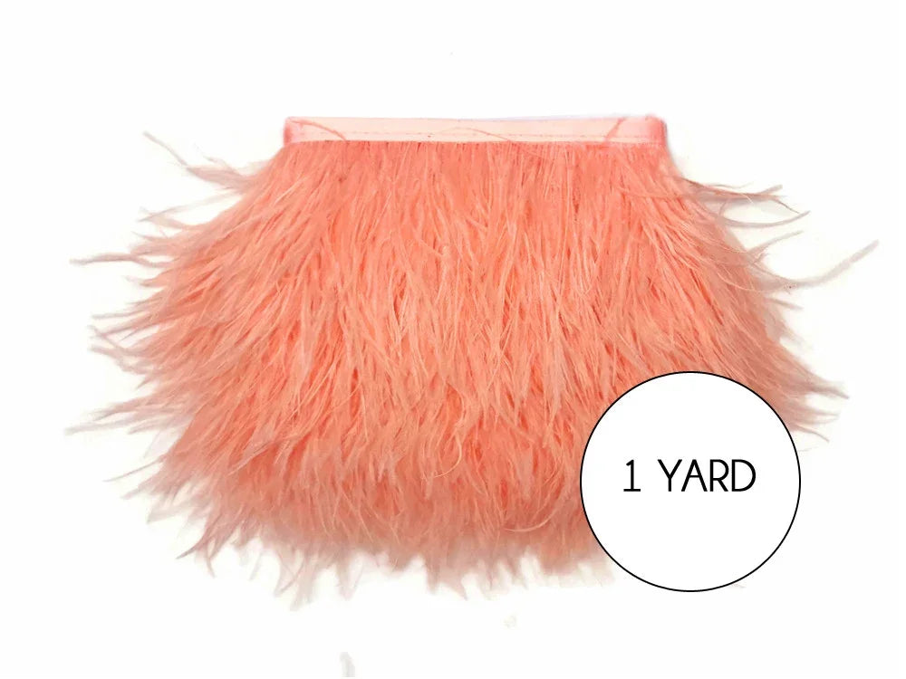 One yard of soft peach ostrich feather trim for crafts and fashion DIY.