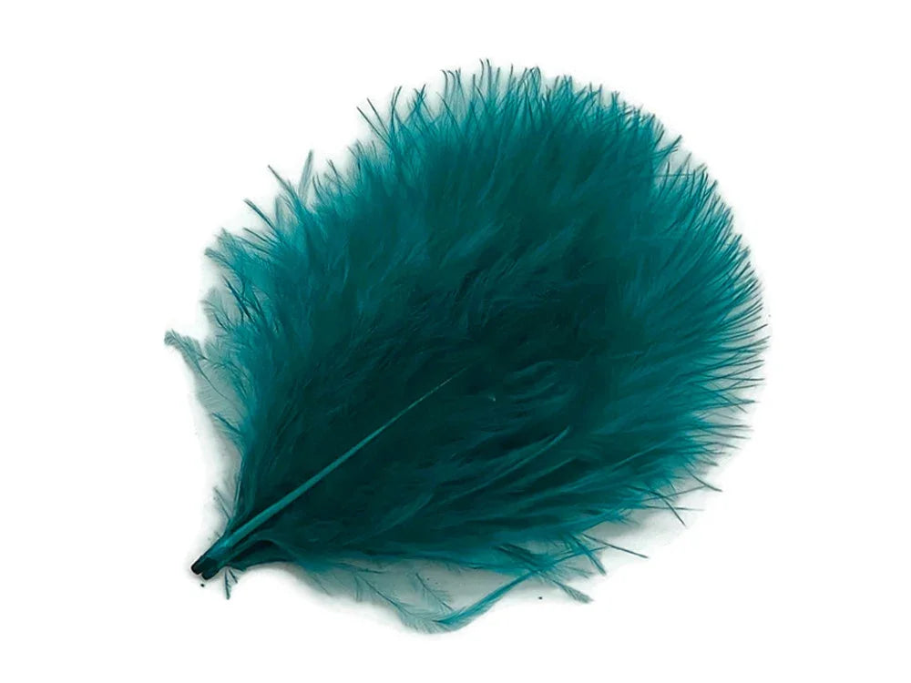 Vibrant teal ostrich feather for crafts, fashion, and DIY decor accessories.