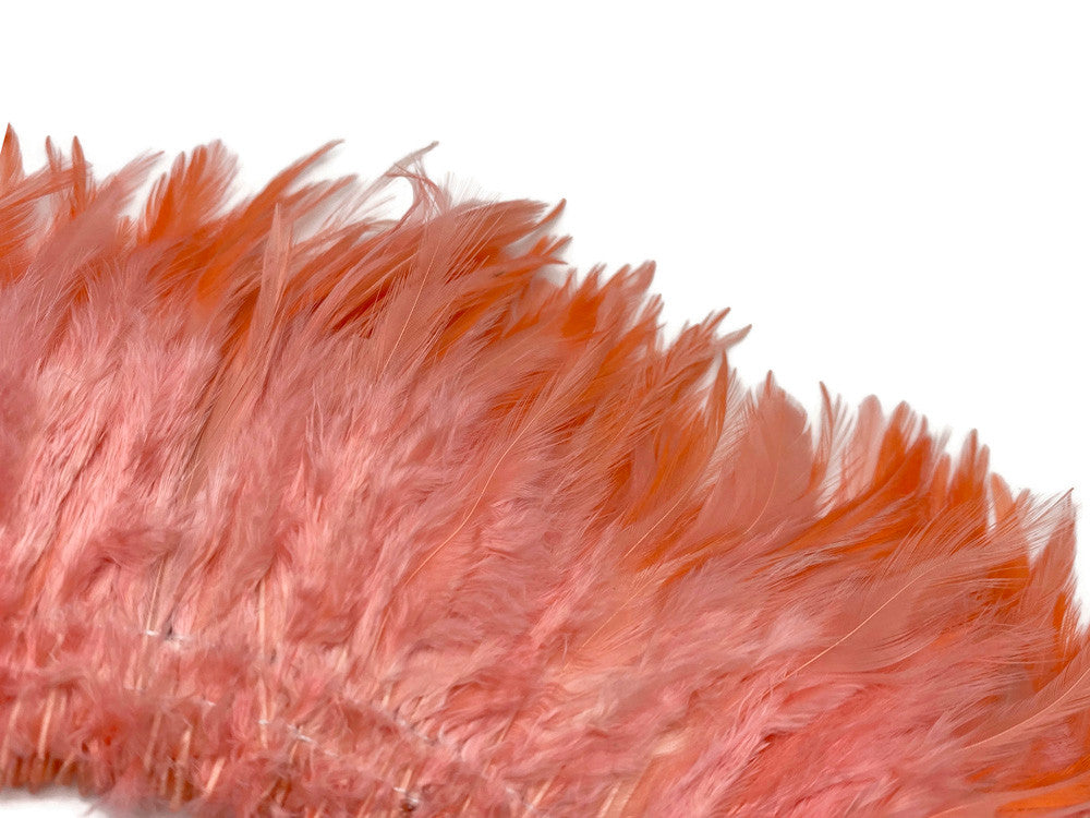 4 Inch Strip – 4-6” Dyed Pink Blush Strung Chinese Rooster Saddle Feathers