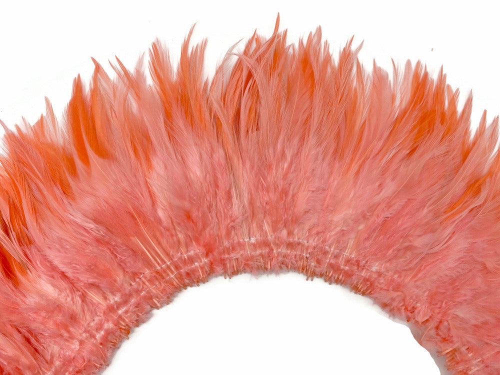 4 Inch Strip – 4-6” Dyed Pink Blush Strung Chinese Rooster Saddle Feathers