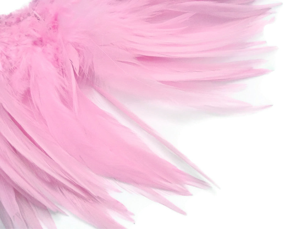 4 Inch Strip – 4-6” Dyed Light Pink Strung Chinese Rooster Saddle Feathers