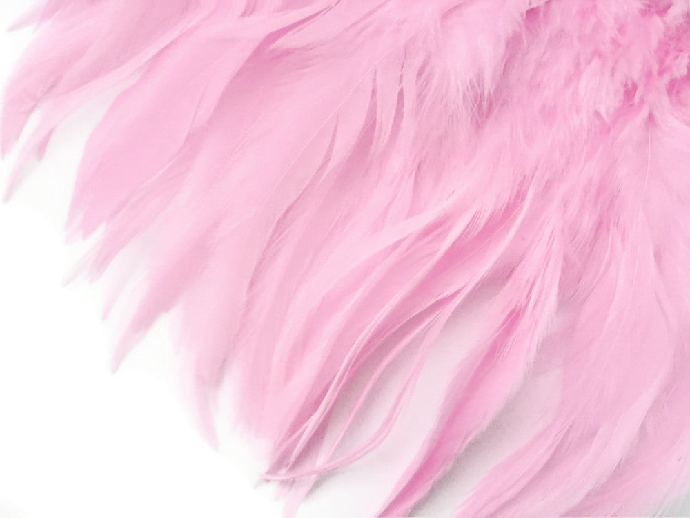 4 Inch Strip – 4-6” Dyed Light Pink Strung Chinese Rooster Saddle Feathers
