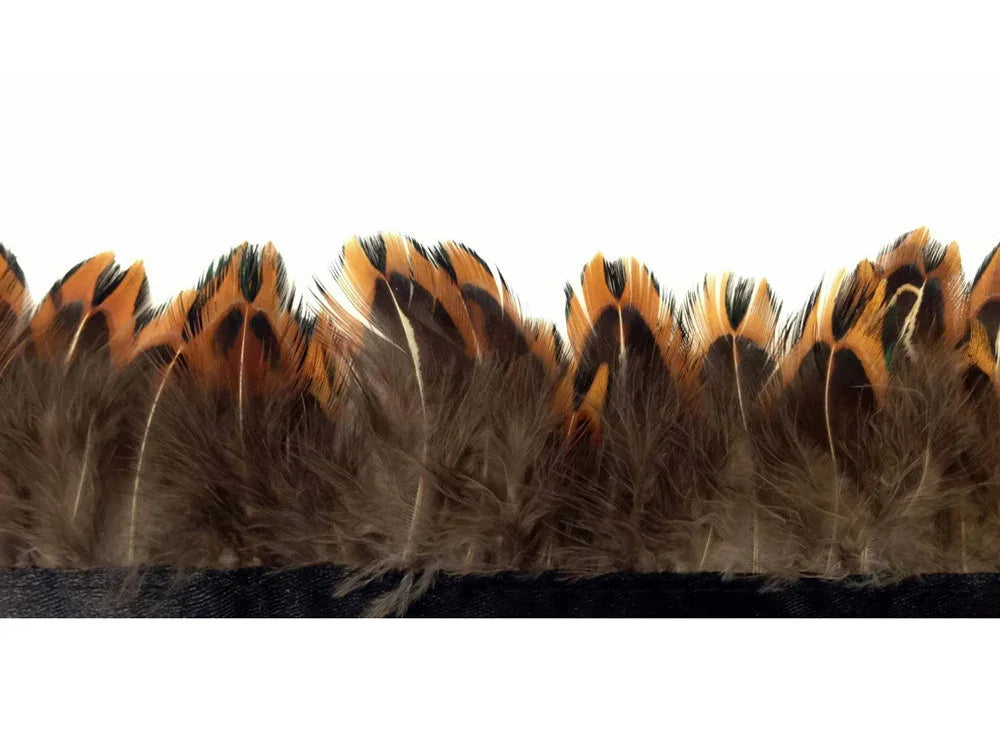 Brown and orange patterned feather trim for fashion and DIY crafts.