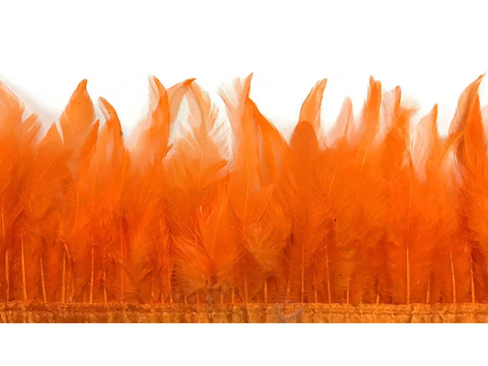 Vibrant orange feather trim for DIY crafts, fashion accessories, and creative décor.