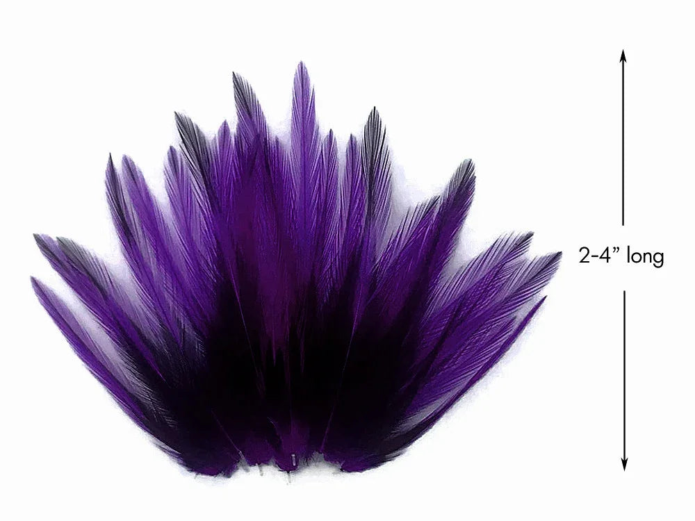 Vibrant purple dyed feathers for crafts and fashion, 2-4 inches long.