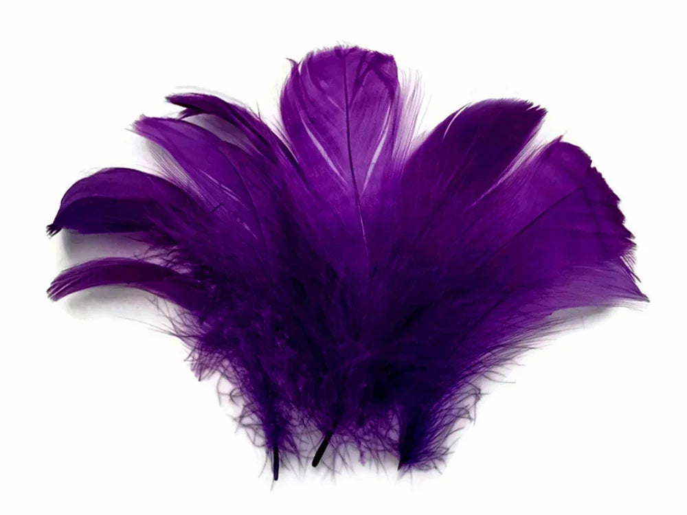 Vibrant purple feathers for DIY crafts, fashion accessories, and creative décor.