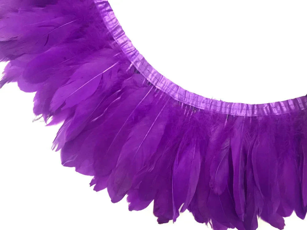 Vibrant purple feather boa trim for fashion crafts and DIY decor.