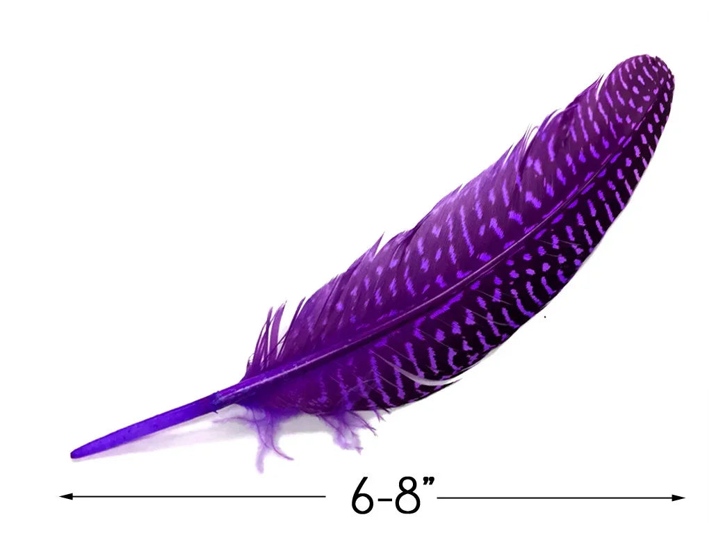 Vibrant purple dyed feather with speckled pattern, 6-8 inches long for crafts and DIY decor.