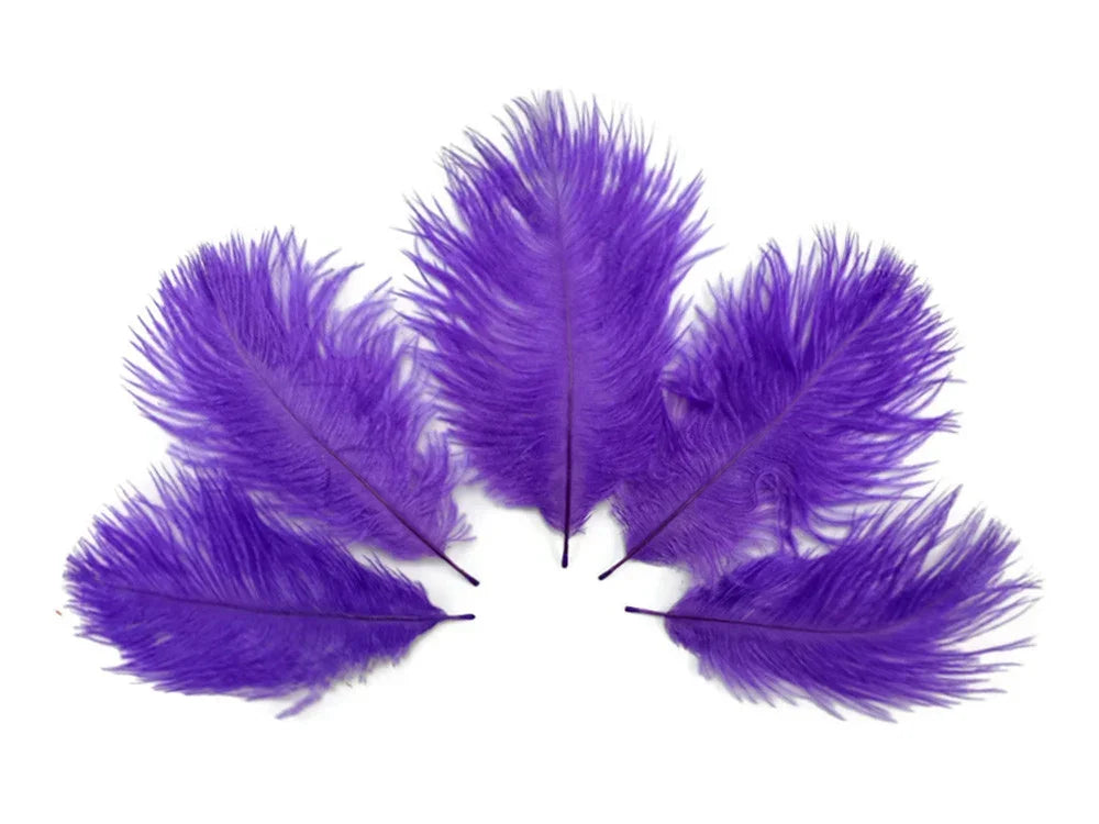 Vibrant purple feathers for DIY crafts and fashion accessories on a white background.