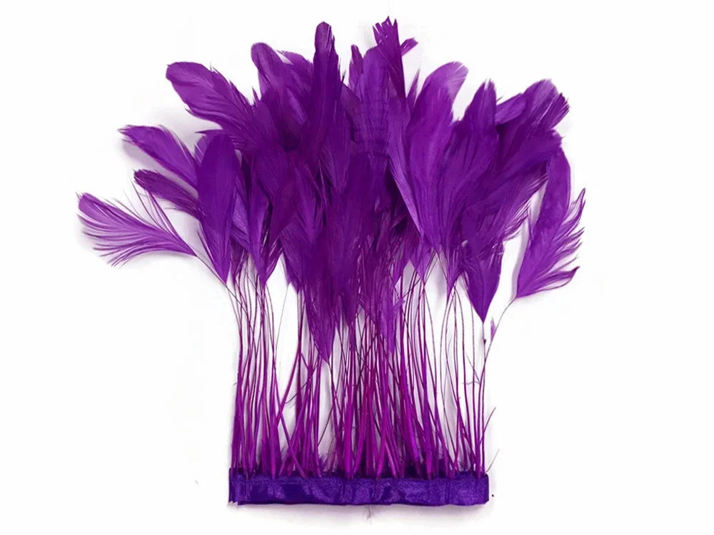 Vibrant purple feathers attached to a headband for fashion accessories and DIY crafts.