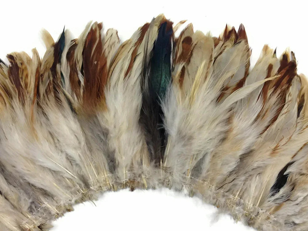 Natural brown and white decorative feathers for DIY crafts and fashion accessories.