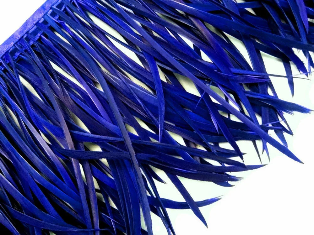 Vibrant royal blue dyed feathers for craft and fashion DIY supplies.