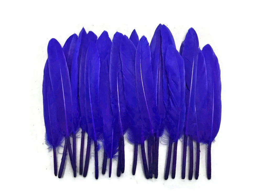 Vibrant cobalt blue craft feathers for DIY fashion and decor accessories.