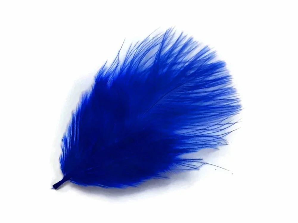 Vibrant cobalt blue feather for DIY crafts, fashion accessories, and costume décor.