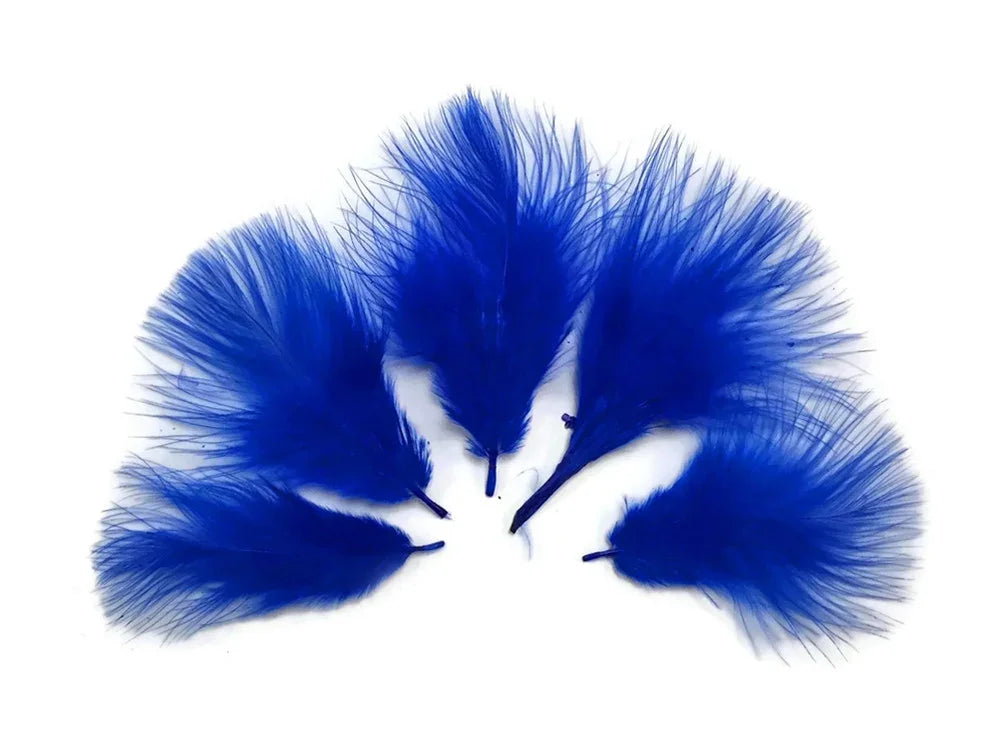 Vibrant cobalt blue craft feathers for DIY fashion and decor accessories.