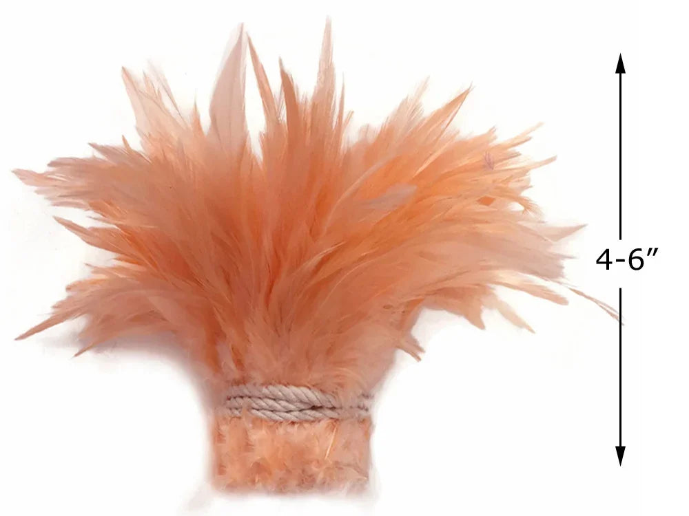 Peach colored fluffy feathers for DIY crafts and fashion decor, 4-6 inches long.