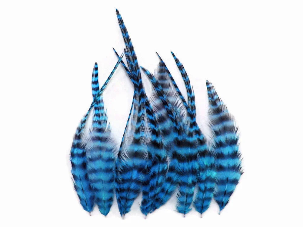 Vibrant blue and black striped craft feathers for DIY fashion and decor.