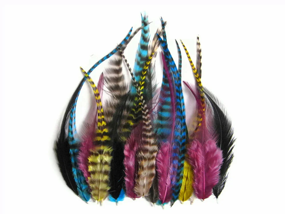 Assorted colorful craft feathers in blue, pink, yellow, and patterned textures on white background.