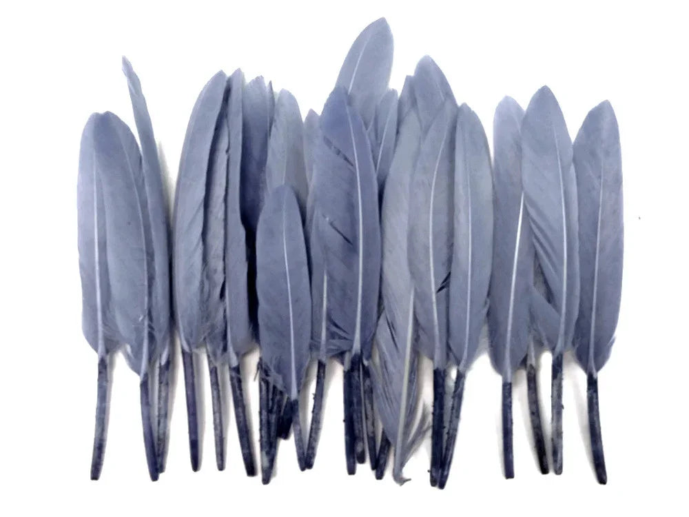 Collection of soft grey craft feathers for DIY fashion and decor projects.