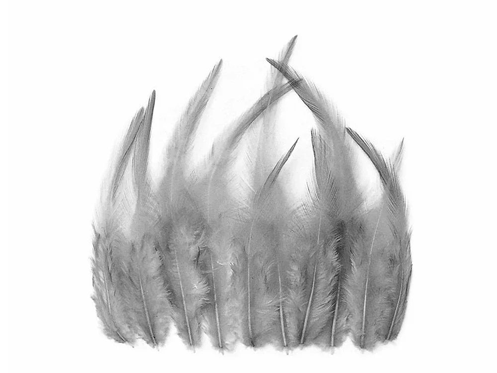 Collection of soft grey craft feathers for DIY fashion and decor projects.