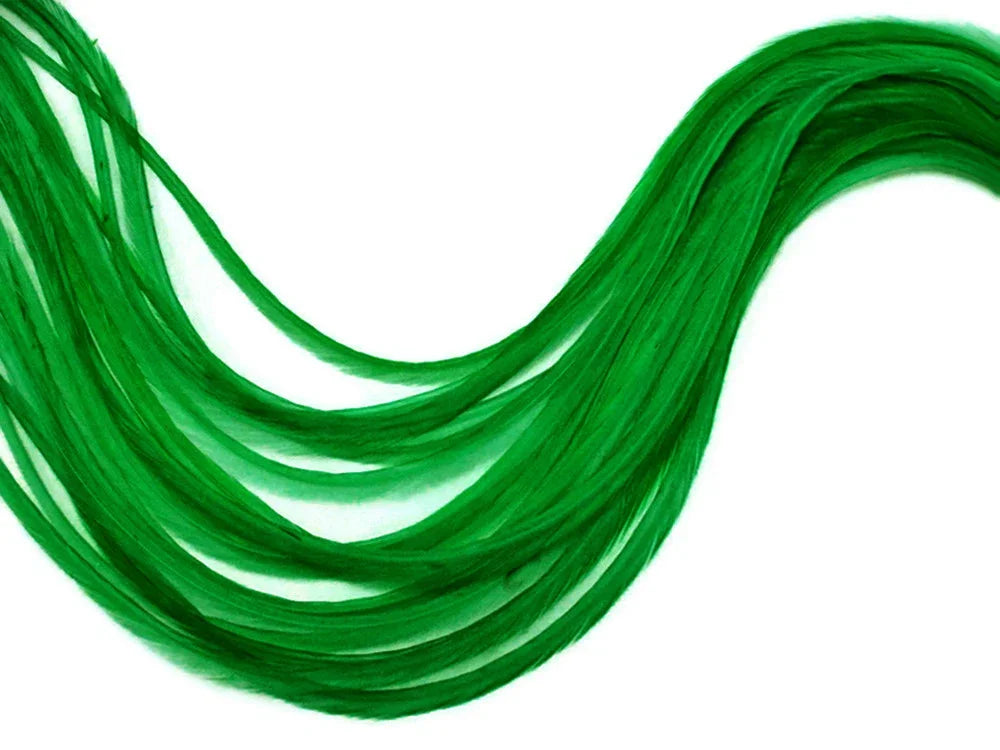 Vibrant green dyed feathers for craft and fashion DIY supplies on a white background.