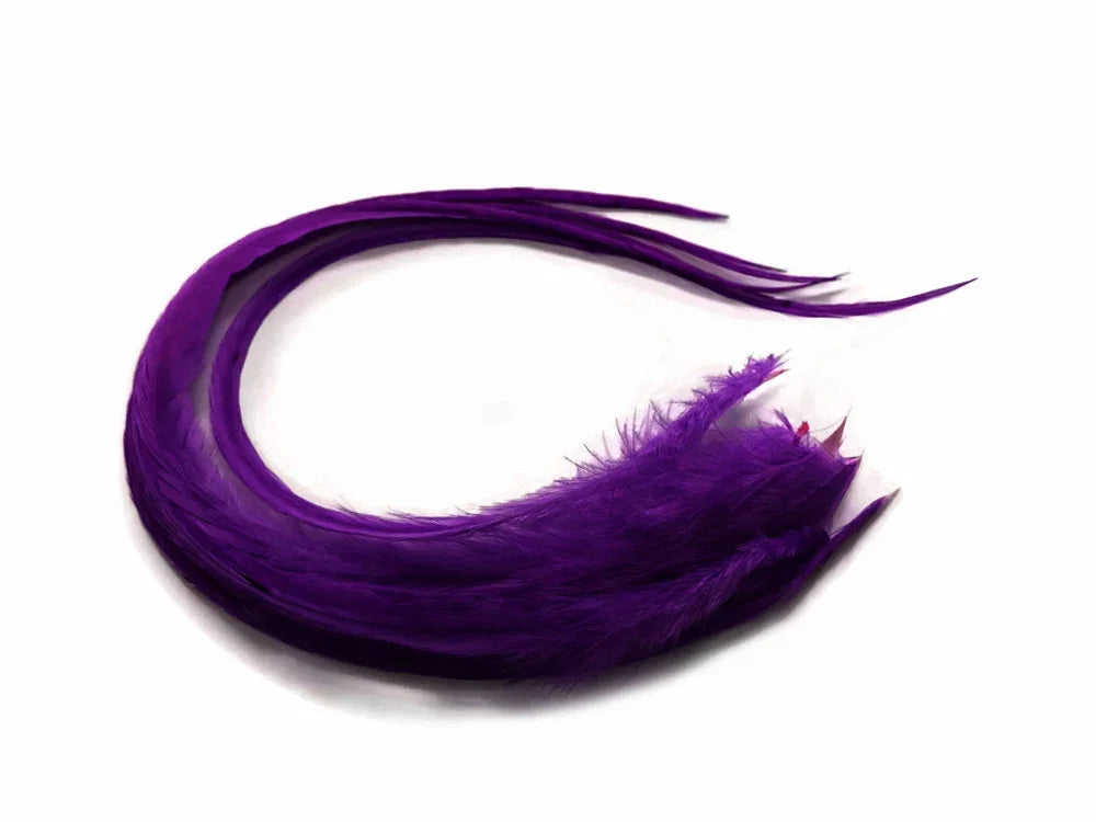 Vibrant purple feathers for DIY crafts and fashion accessories on a white background.