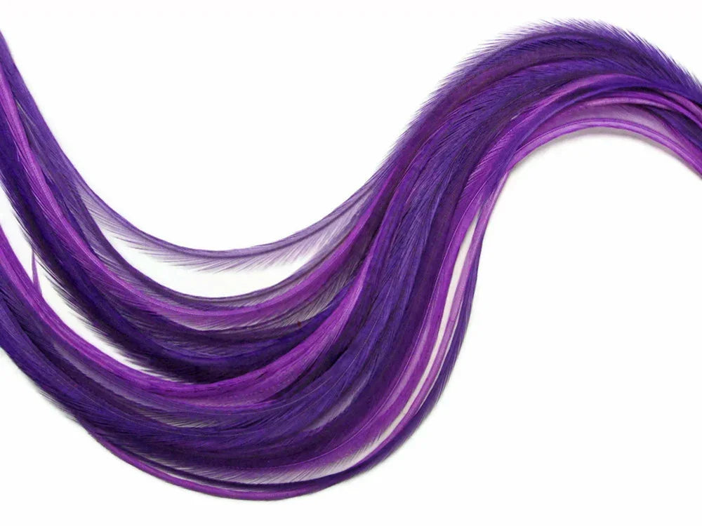 Vibrant purple craft feathers for DIY fashion and decor accessories on a white background.