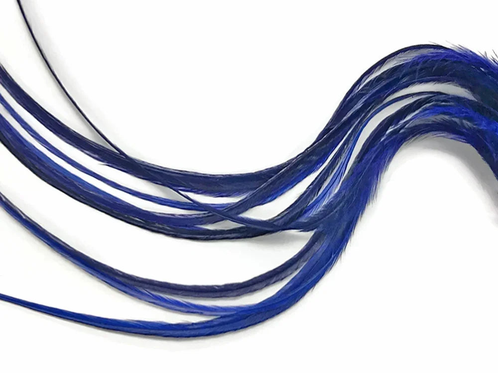 Vibrant cobalt blue feathers for DIY crafts and fashion accessories on a white background.