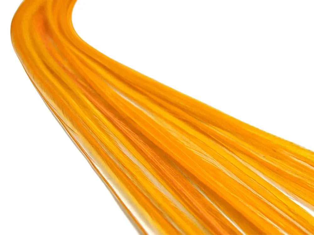 Vibrant orange flowing feathers for craft and fashion DIY projects.