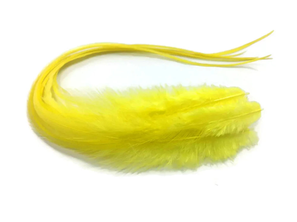 Vibrant yellow feathers for DIY crafts and fashion accessories on a white background.