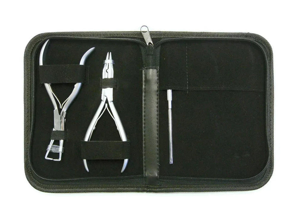 Jewelry making tool kit with pliers, crimping tool, and applicator in a black carrying case.