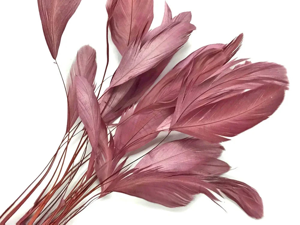 Dusty rose pink feathers for DIY crafts, fashion, and decor accessories.