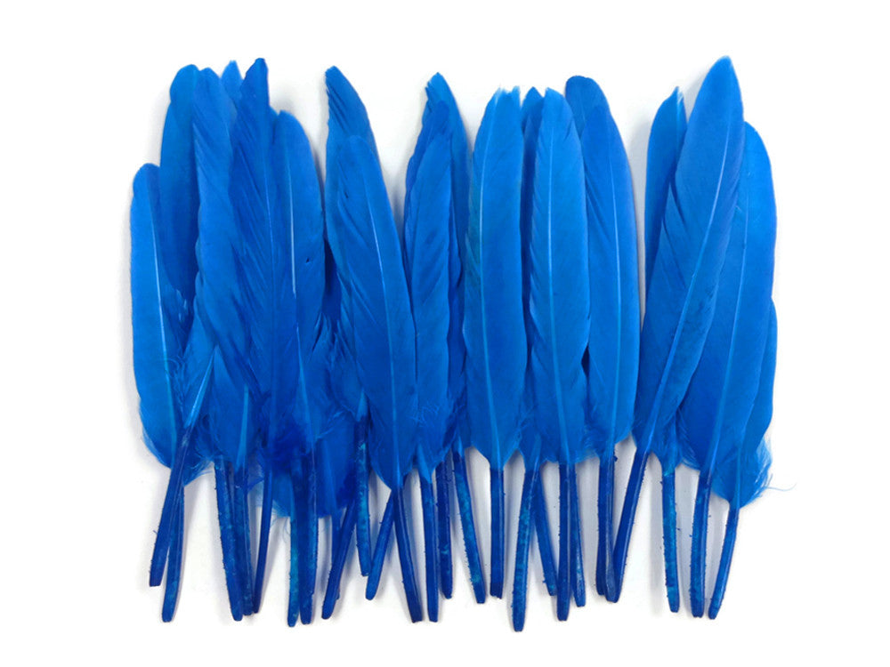 Vibrant blue craft feathers for DIY fashion and decor accessories.