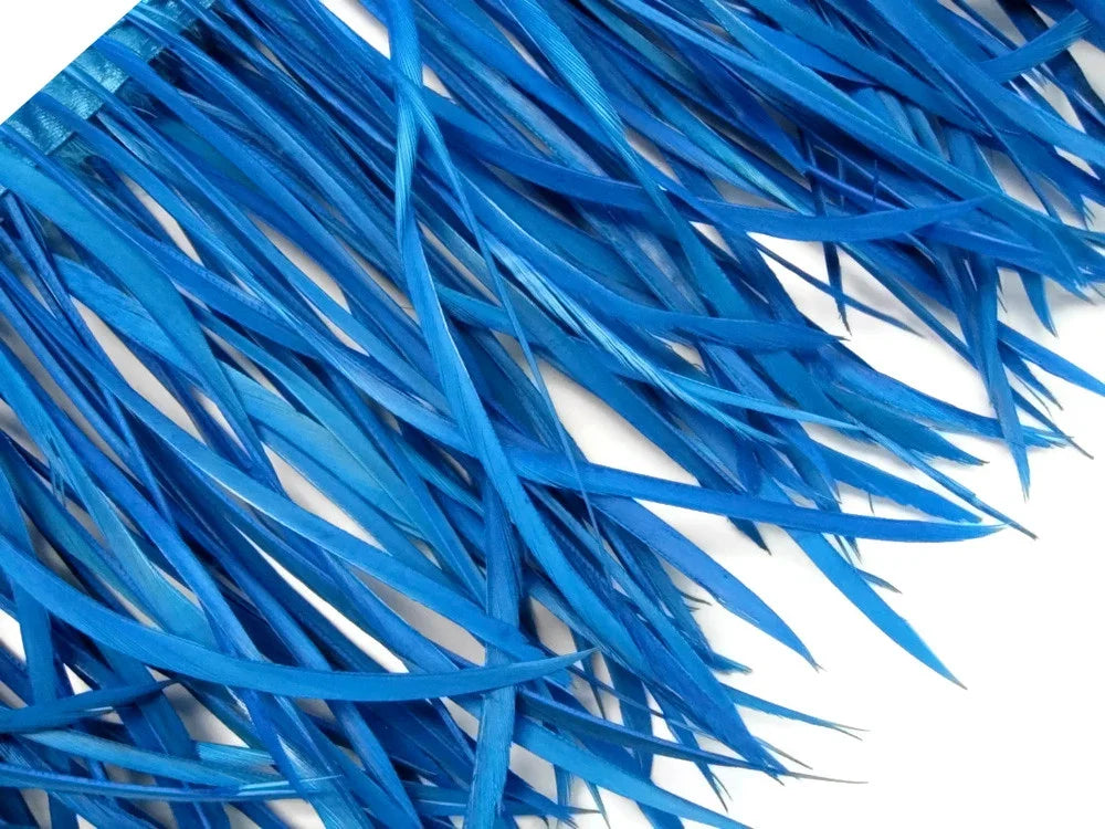 Vibrant blue dyed feathers for fashion crafts and DIY costume decorations.