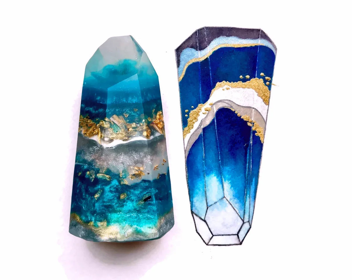 Blue and teal resin crystal tower with gold leaf accents and white marble effect.