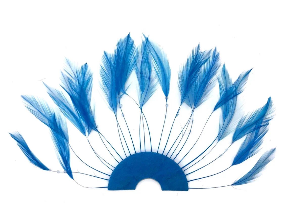 Vibrant blue feathers arranged in a fan shape for DIY crafts and fashion decor.