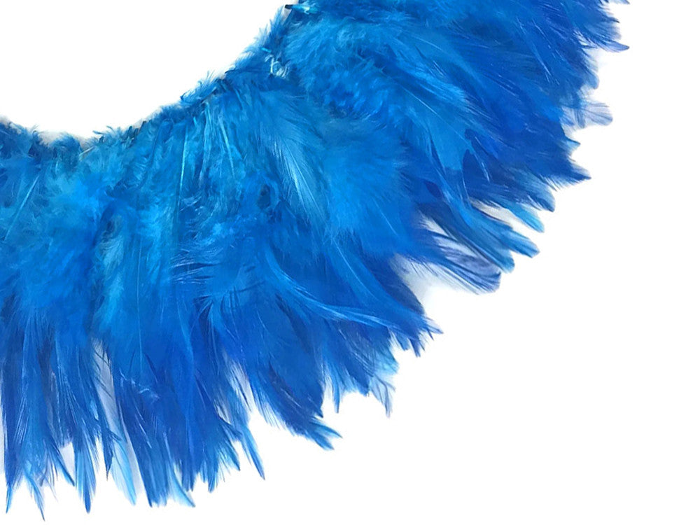 4 Inch Strip – 4-6” Dyed Turquoise Blue Strung Chinese Rooster Saddle Feathers