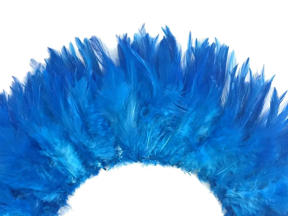 Vibrant bright blue ostrich feathers for DIY crafts and fashion accessories.