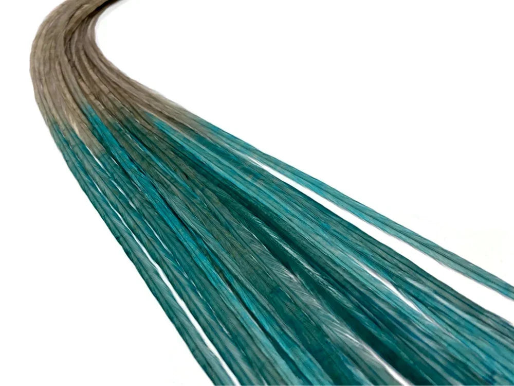 Teal and brown dyed craft feathers for DIY fashion and decor accessories.