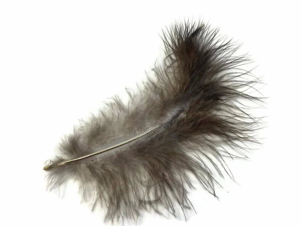 Soft brown natural feather for DIY crafts and fashion décor on a white background.