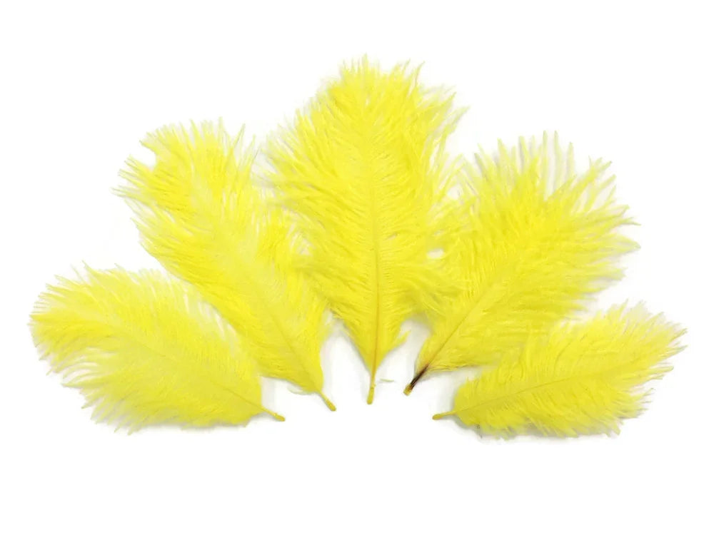Bright yellow ostrich feathers for crafts, fashion, and DIY décor decoration.
